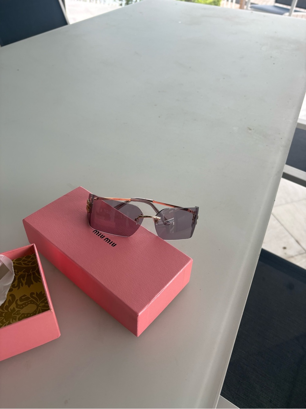 Miu Miu Pink Lens Rimless Sunglasses with Gold Accents